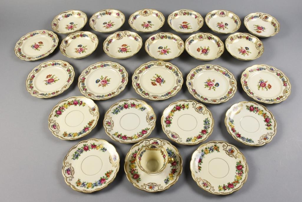 Royal Bayreuth Nurenberg Porcelain Plates Coasters & More: Nice assorted porcelain from Royal Bayreuth. In the Nurenberg pattern. All with flower rim accented in gold and floral center spray. Includes 11 dessert bowls, six bread and butter plates, seven sauce