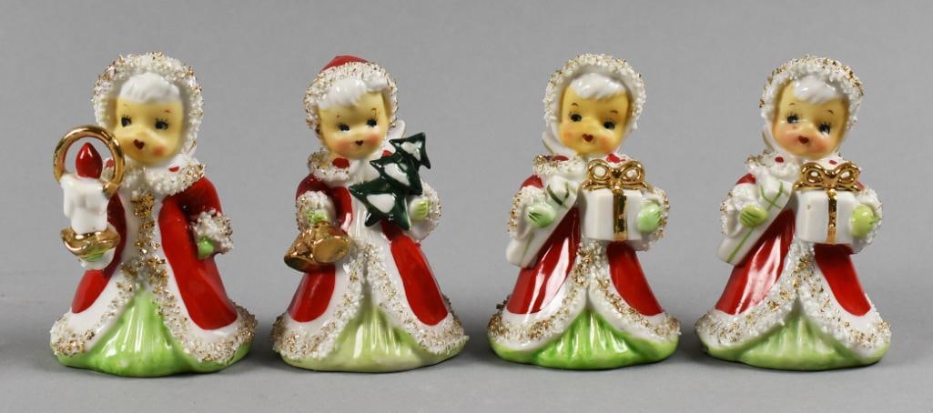 Vtg Lefton's Porcelain Christmas Angels Bells Set of Four: Darling set of four Christmas angels bells from Lefton's Japan. Each porcelain figurine in painted red with green dresses under their coats. Two are holding gifts, one holding a tree and one with a ca