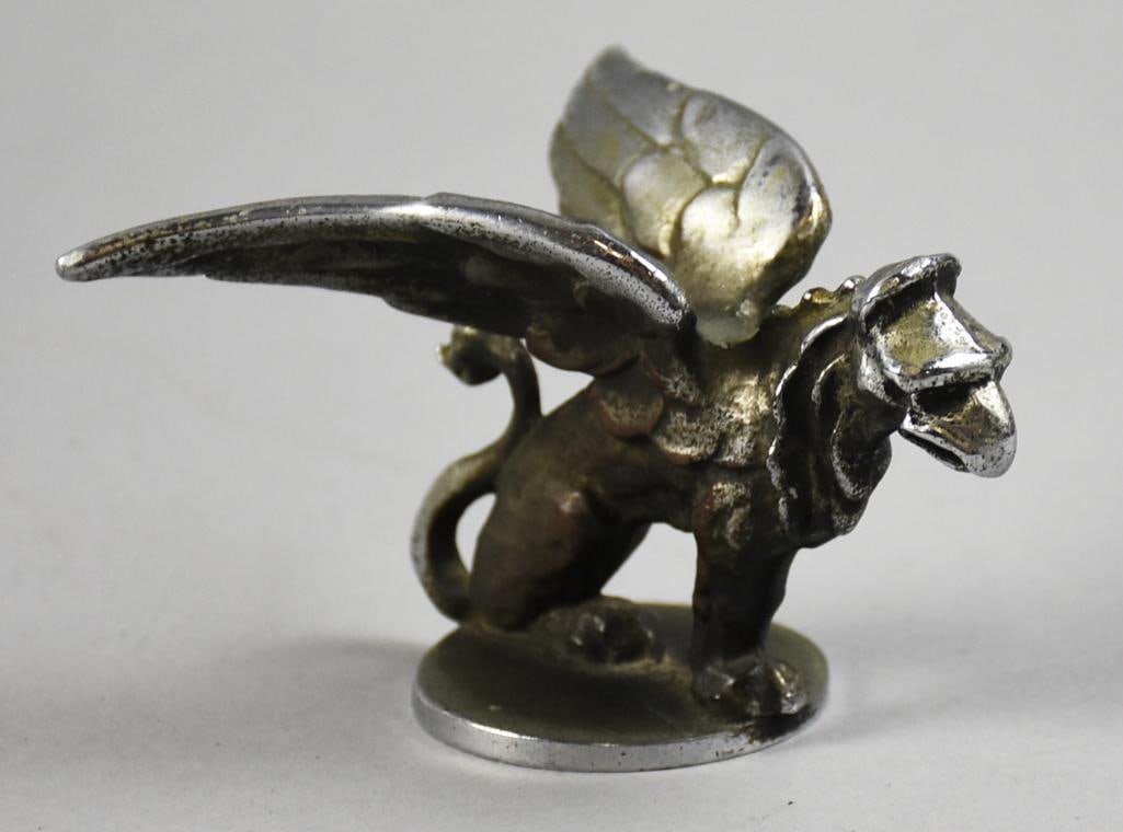 c1920 Gardner Griffin Car Mascot Hood Ornament: Very cool antique hood ornament. It is known as the Gardner Griffin and is a car mascot. Possibly brass with chrome plating. Not visible marks and measures approx. 3" x 4.5".?