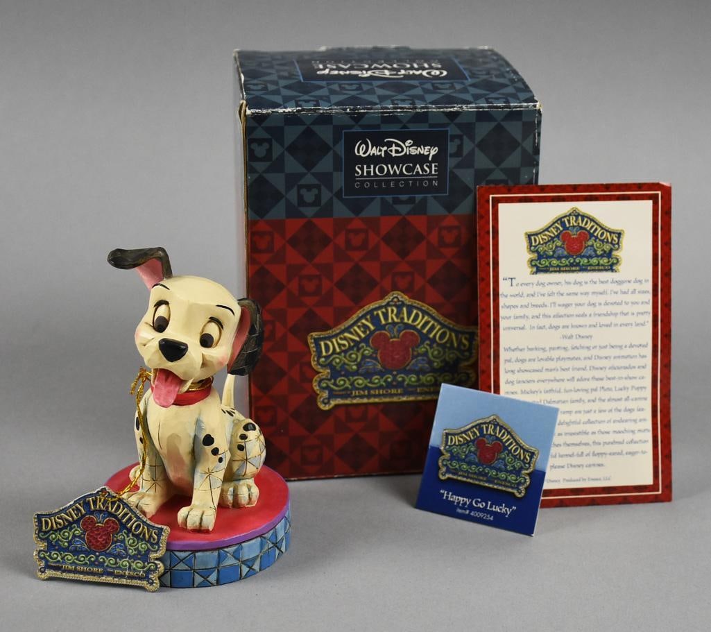 Signed Disney Showcase Collection Happy Go Lucky Jim Shore: Adorable Disney Showcase Collection figurine created by Jim Shore. Signed by Jim SHore 2007. It is called Happy Go Lucky and comes in the original box with string tag.?This item comes from a very pass