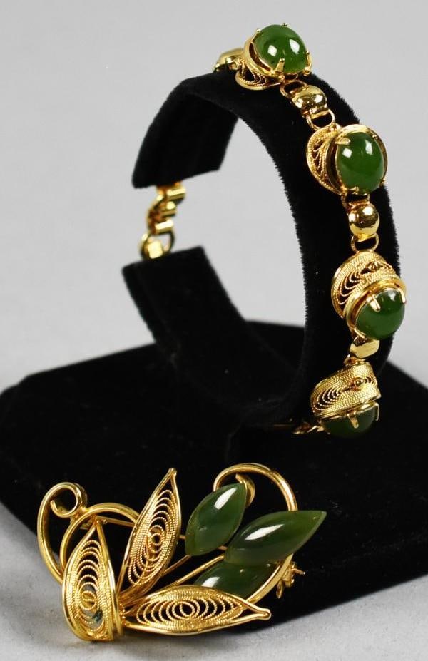 Chinese Gold Plate Jade Bracelet and Brooch: Beautiful vintage Chinese jade jewelry that includes a bracelet and matching brooch. Each piece with gold plate or gold filled filigree. Brooch is approx. 2" long.