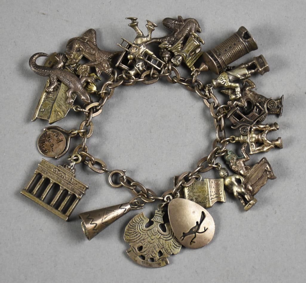 Vintage Sterling Charm Bracelet Peruvian 835: Very awesome vintage charm bracelet that is believed to contain mostly Peruvian 835 charms, but also includes some sterling pieces as well. Full with animals, buildings, people and more, appear to hav