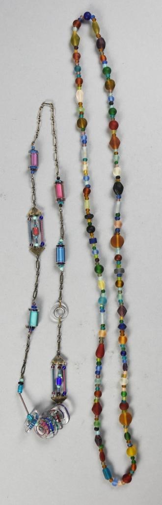 2 Glass Bead Necklaces: These are lovely necklaces with one being strung with frosted glass beads and one with chain and what appear to be hand crafted beads. Measure approx. 28" and 40".