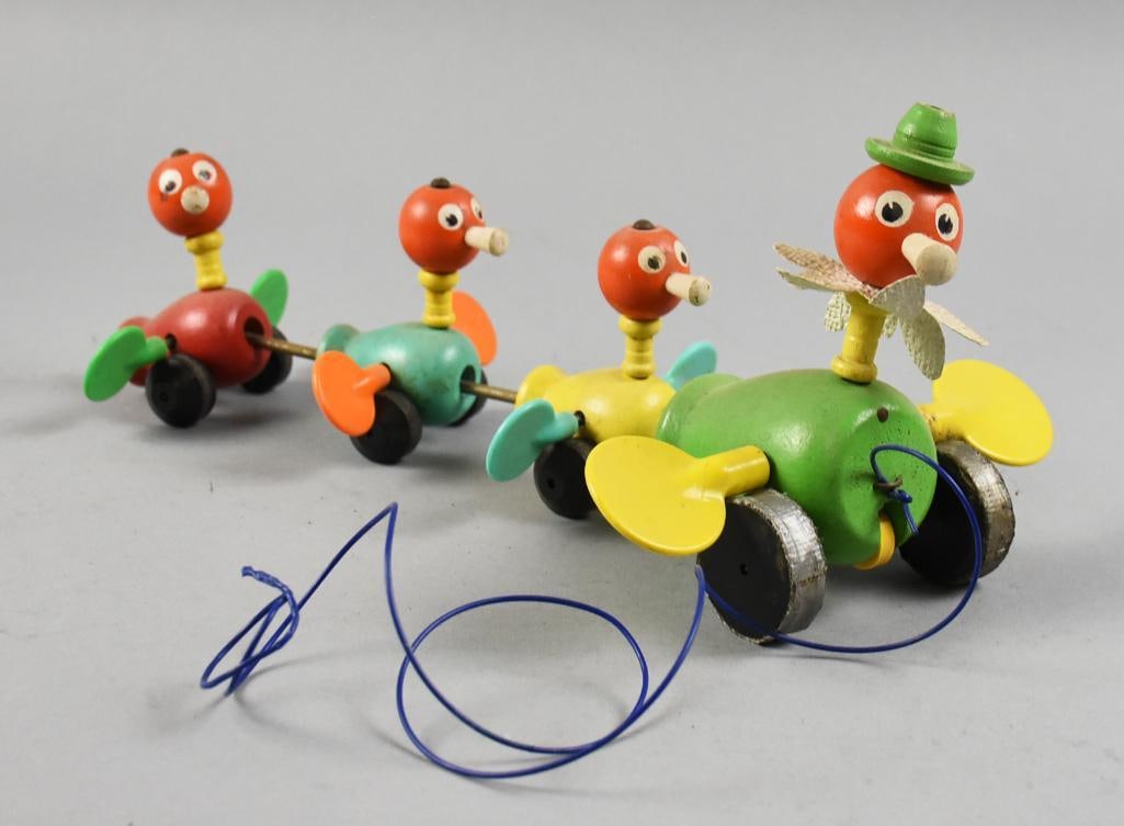 c1960 Fisher Price Toys, Gabby Goofies Wooden Pull Toy: This darling piece is a vintage pull toy from Fisher Price. It is called Gabby Goofies. One large duck and three small, all in primary colors. Ducks are wooden and have wooden wheels and what appears