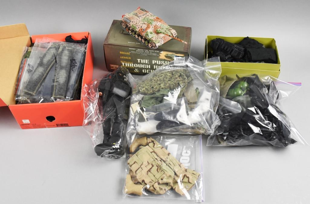 Misc. Assorted Scale Uniforms & Accessories Loose: Lot is Misc. Assorted Scale Military Uniforms & Accessories-Loose. Includes SWAT and Military uniforms and other clothing pieces, boots and other accessories as well as a tank in original box. Single