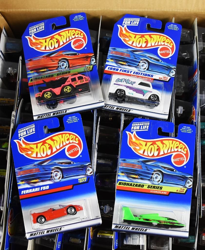 1990s Mattel Hot Wheels Factory Shipping Case MOC-NOS: Lot is a 1990s Mattel Hot Wheels Factory Shipping Case-MOC-NOS. Case includes one additional car for a total of 73. Single owner collection from the largest toy collector on the West Coast.