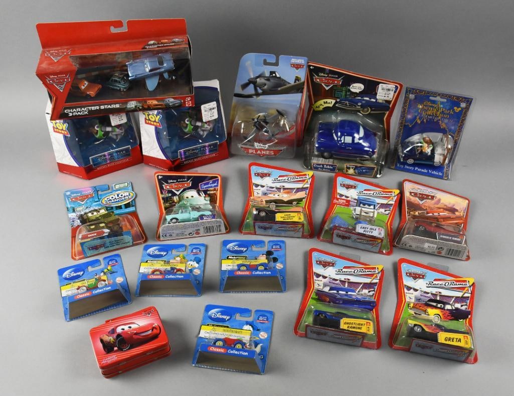(17) 2000s Disney Movie Assorted Cars/ Toys MIP-NOS: Lot is 17 2000s Disney Movie Assorted Die-Cast Cars and Action Figures-MIP-NOS. Includes Lightning McQueen tin, Character Stars 3 Pack, two Rocket Buzz Lightyear,?Planes (Cars), Crash Talkin', Toy Sto