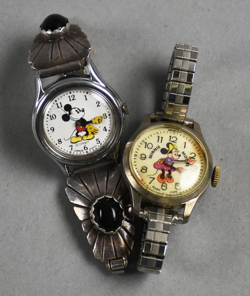 Vintage Lorus & Bradley Mickey and Minnie Mouse Watches: These are cute his and hers watches representing Mickey and Minnie Mouse. The first watch for Mickey is a Lorus with base metal bezel and stainless back. The stretch band with what appears to be sterl