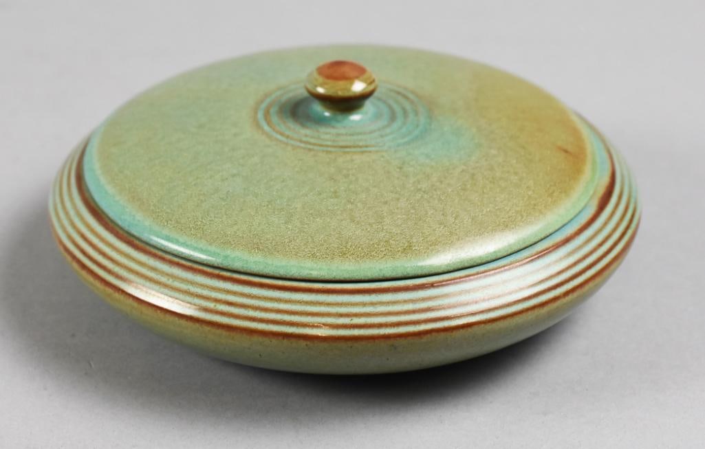 Nicodemus Art Pottery Ferro-Stone Lidded Bowl: Fantastic vintage Nicodemus pottery bowl with lid. Created using ferro-stone clay, ribbed around the rim with lid. In a pretty light blue green high gloss translucent glaze. Measures approx. 7" wide.