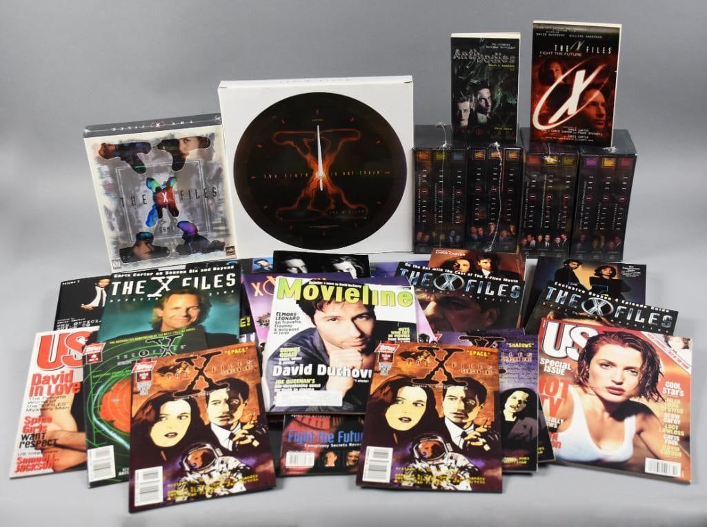 X Files HUGE Assortment of Collectibles, Magazines, VHS & More: Great assortment of X-Files collectibles. Includes a game, magazines, VHS tapes. etc. Single owner collection from the largest toy collector on the West Coast.