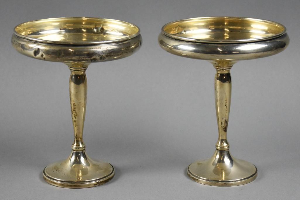 Pr. Sterling Silver Compotes 925 Weighted: These are a pair of very pretty vintage sterling compotes. They are simple but elegant with low sided basin, long stem and stepped base. They are marked on bottom, note they are cement filled with rod