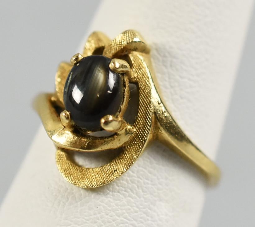 14K Yellow Gold Labradorite Lady's Ring, Signed: This beautiful ring is 14K yellow gold.It appears to be a custom piece with textured gold and a cabochon labradorite stone in four prong setting. It is designer signed C with L inside as well as gold