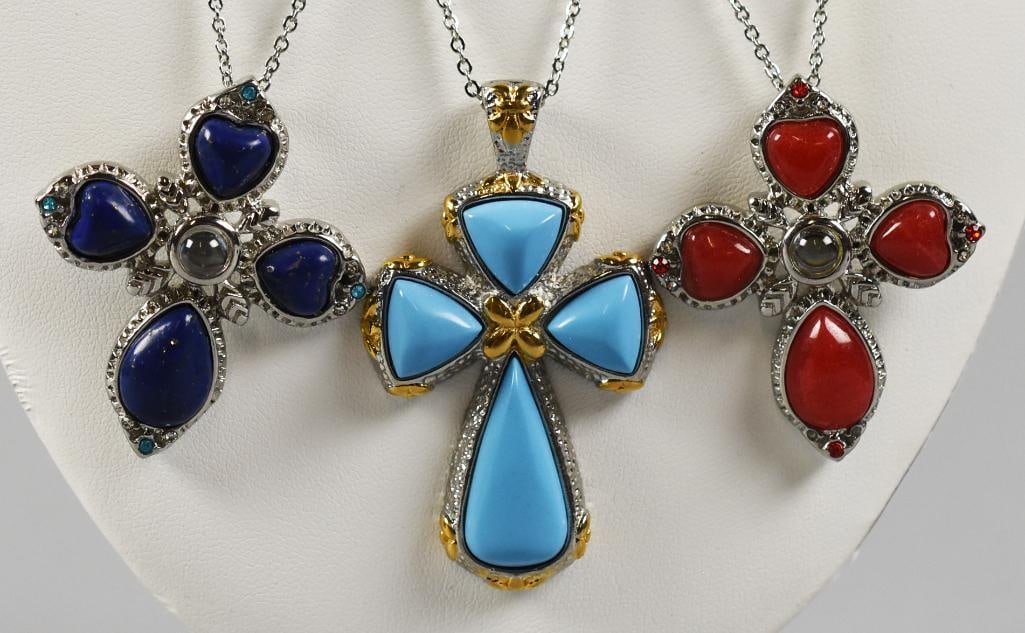 (3) Stainless Steel Cross Pendant Necklaces, Glass Stones: Lot is for three necklaces with pretty crosses. Each cross is stainless steel with glass stones in red, turquoise and deep blue that resembles lapis lazuli.