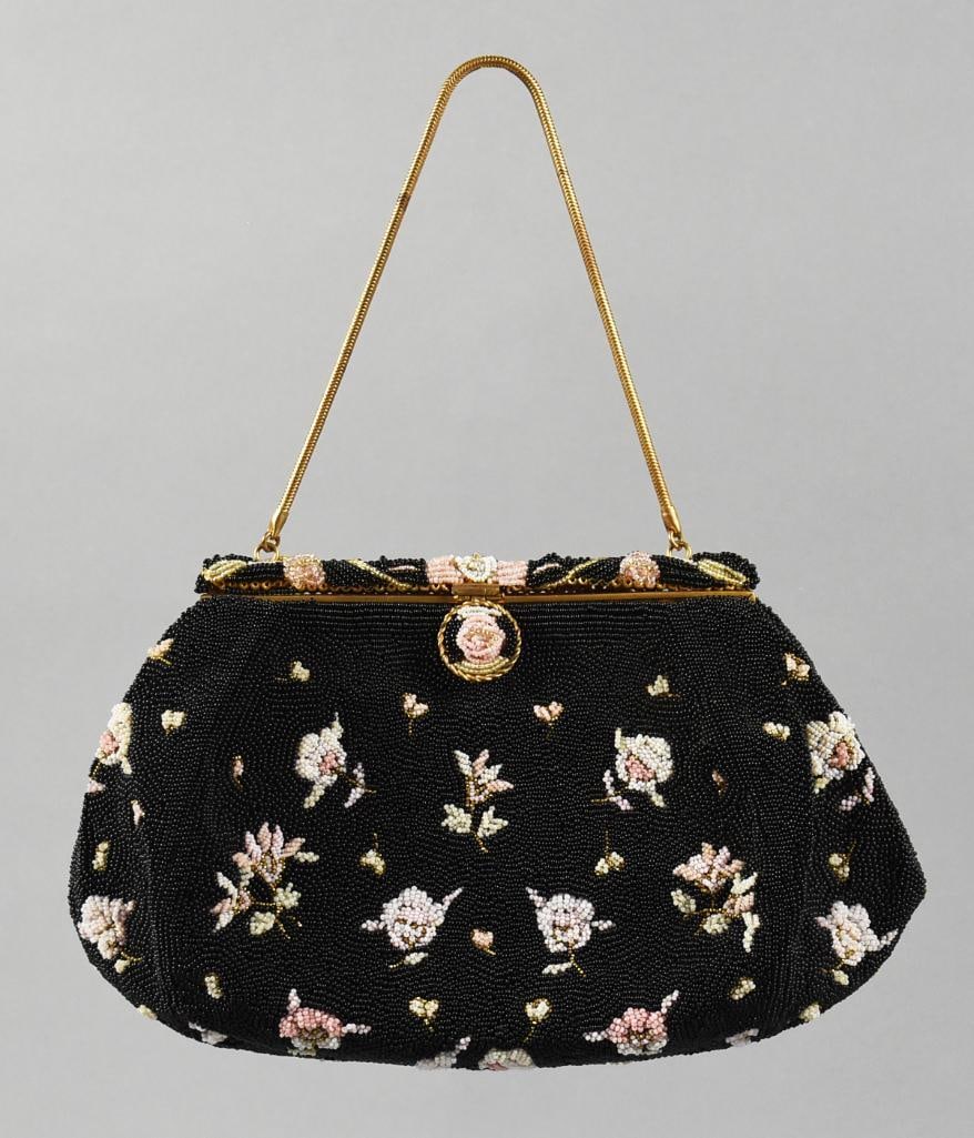 Vintage French Beaded Evening Purse, Hand Made: Stunning vintage ladies evening purse that was made in France. Incredible bead work, black with pink and white flowers with gold bead stems. Snap lock closure, also hand beaded with a gold tone rope c