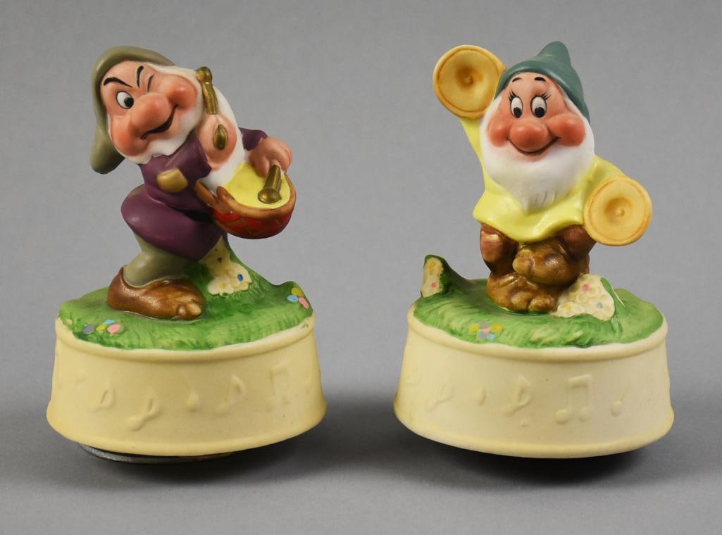 Schmid Snow White & the Seven Dwarfs Music Boxes: Fun pair of vintage Schmid music boxes with two characters from Snow White and the Seven Dwarfs. The two characters are Grumpy who plays Que Sera Sera, retains 50th Anniversary stickers, Happy plays Y