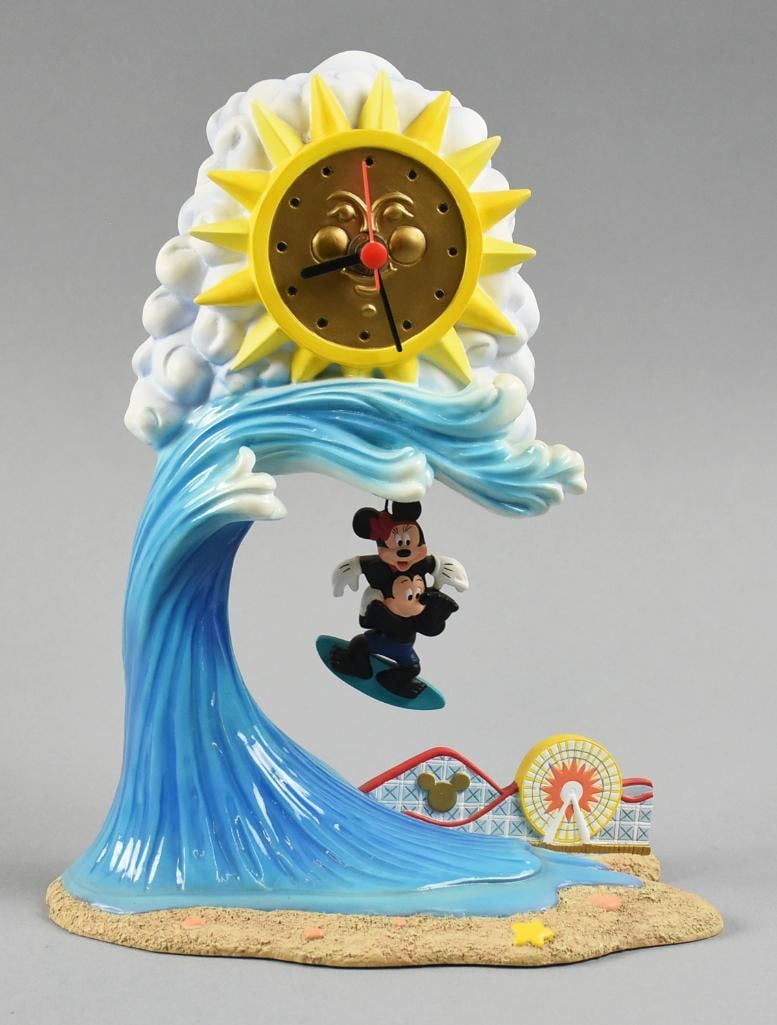 Disney California Adventures Opening Year Commemorative Clock: This is a great piece commemorating the opening of Disney's California Adventures. Mickey surfing a large wave with clock face sun looking over him and a roller coaster in the background. It has been