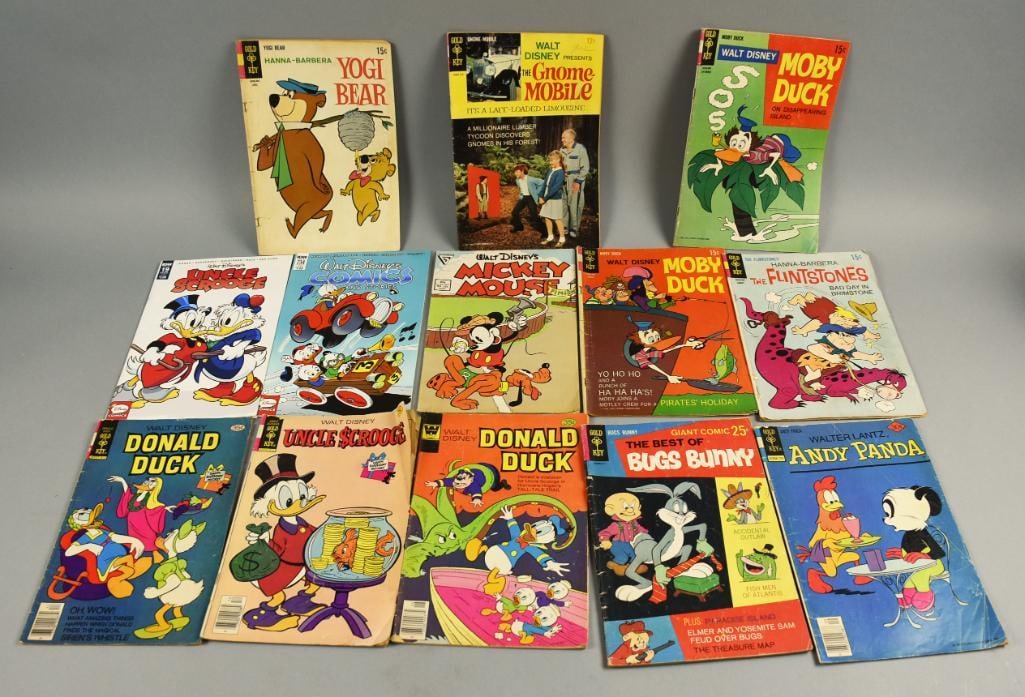 Disney Comic Books (13) 1950s-80s, 2016 Gold Key PLUS: Lot is 13 1950s-80s, 2016 Gold Key PLUS Disney Cartoon Comic Books. Includes Yogi Bear, Uncle Scrooge, Andy Panda, Moby Duck, The Gnome Mobile, Mickey, Donald, Flintstones, Bugs Bunny and Walt Disney