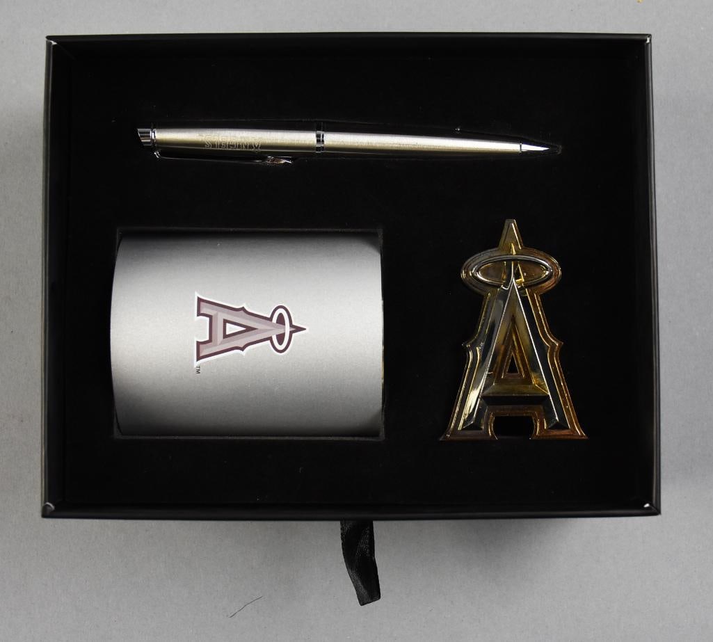 Anaheim Angels Holiday Desk Set in Original Box: Great set from the Anaheim Angels. This desk set includes a pen, A insignia that appears to be a paperweight and cup with Angels logo on one side and Ohtani and Trout shaking hands on the other. Comes