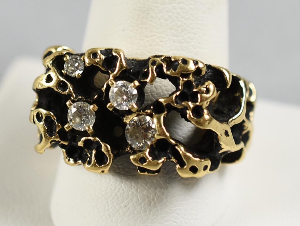 Vintage 14K Yellow Gold & Diamond Nugget Ring: This is a very cool vintage 14K yellow gold ring. It is in the style of a gold nugget, appears to be black enamel set with diamonds. The larger of the diamonds is approx. 1/4 carat, the smaller are ap