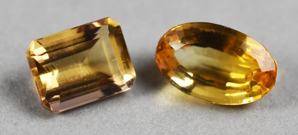 2 Citrine 5.4 ct & 7 ct Oval & Emerald Cut: Pair of beautiful citrine. One is approx. 5.4 carat, one is approx. 7 carat. Oval and emerald cut. Wonderful for your jewelry creations.
