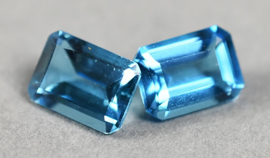 2 London Blue Topaz, 2.2 ct Emerald Cut: Pretty pair of emerald cut London blue topaz. Both total approx. 2.2 carats. Would make a lovely pair of earrings.