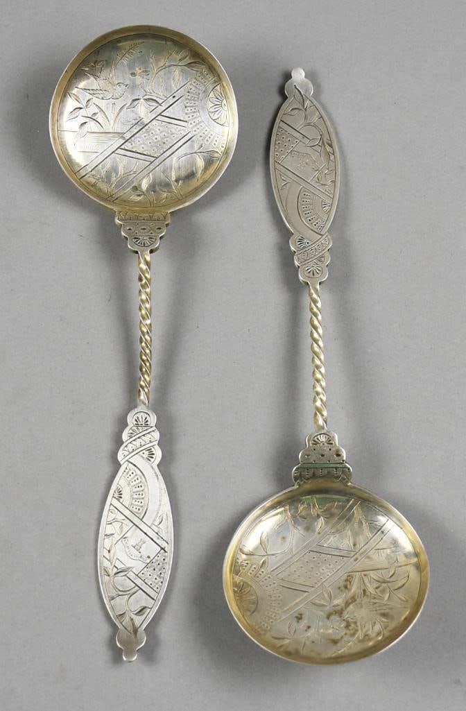1882 Charles Mappin Sheffield Engraved Sterling Spoons: This is a gorgeous antique pair of Sheffield sterling spoons. The handles are foliate and fan designs with?Ardua Tendit inscribed. Inscription represents a Highland Scottish clan "MacCallum".?Twist st