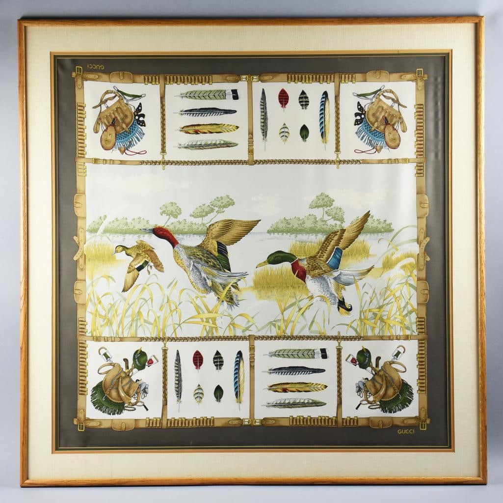 Gucci Duck Harness Silk Scarf, Framed: Beautiful silk scarf from the Gucci brand. The design is called Duck Harness with hiking gear and duck feathers along the top and bottom borders. With frame and matte, measures 40" x 40"