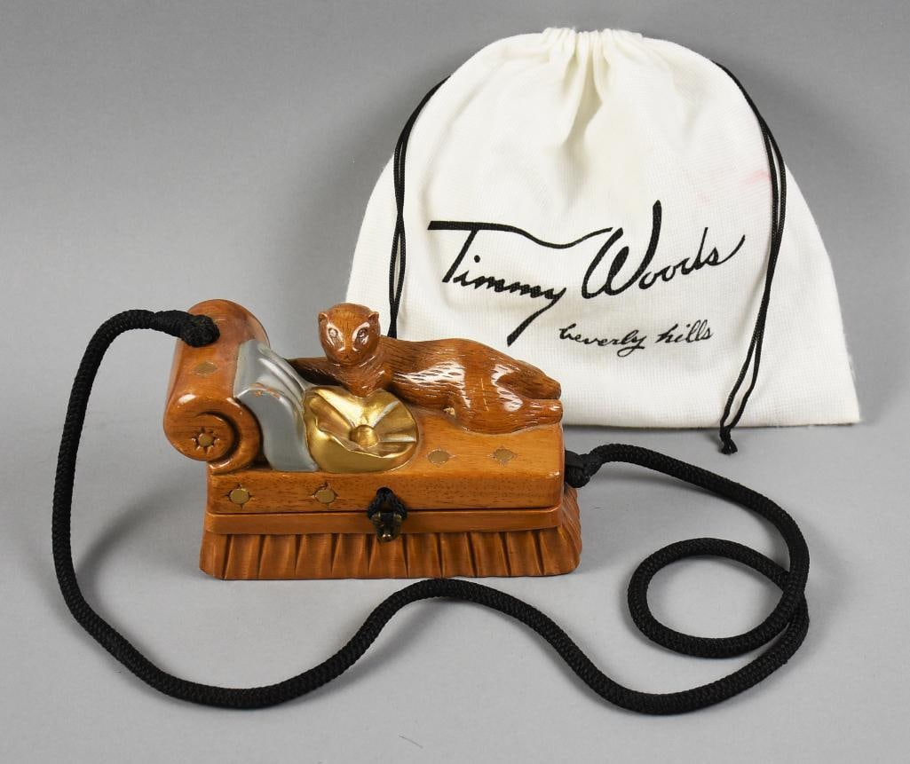 Timmy Woods Cat on Lounger Purse with Dust Bag: Darling Timmy Woods of Beverly Hills purse made from acacia wood. This kitty is on a lounging sofa with pillow and rope style handle. Opens under the cushions with hinged back. Lined with satin with