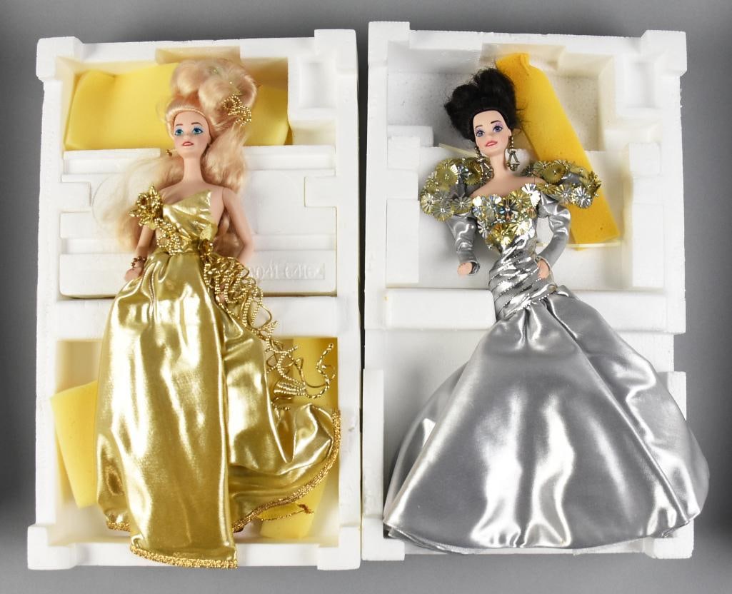 1993 Mattel Barbie Gold Sensation, Silver Starlight NRFB: Both of these beautiful Barbies are limited editions from Mattel. Silver Starlight with silver toned dress, jewelry and more - Serial number 521. Gold Sensation with gold toned dress and 22K electropl