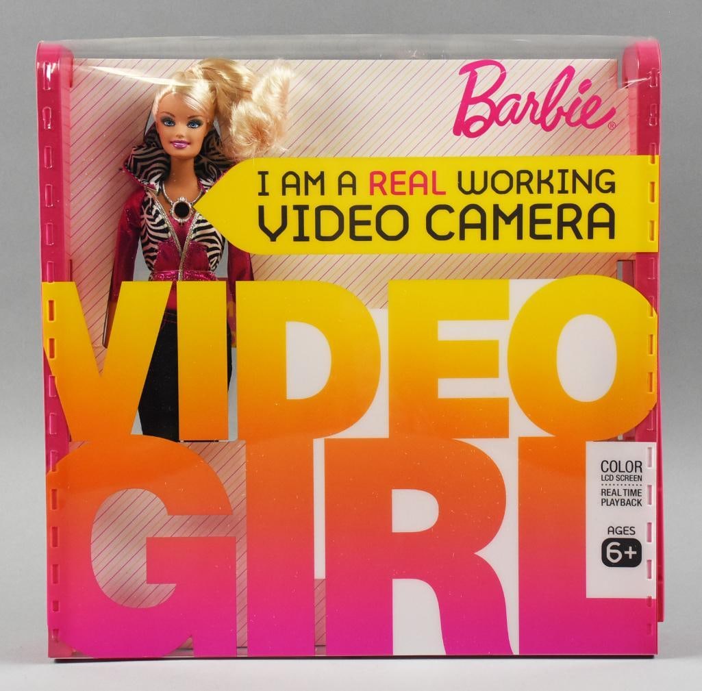 2009 Mattel Barbie Video Girl Camera Doll MIB NOS: Great Mattel Barbie Video Girl. Allowed users to record about 30 minutes of video to download. Camera in the front with screen viewer on her back. She was controversial, the FBI expressed concern in r