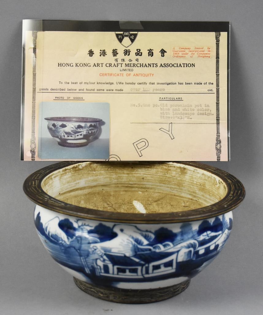 Qing Dynasty Blue & White Porcelain Iron Rim Bowl COA: Chinese porcelain bowl with blue and white painted design depicting a scenic landscape, including buildings, trees, and water. Features a metal rim and painted base. Signs of wear consistent with age,