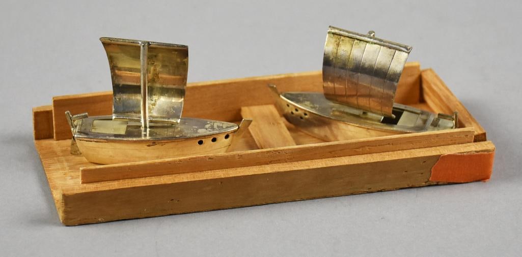 Vintage Japanese 950 Silver Sailboat Salt & Pepper: Very cool vintage salt and pepper shaker from Japan. They are in the form of sailboats. The backs slide open to add your seasoning. Each boat is stamped on bottom sterling 950. They will come in the o