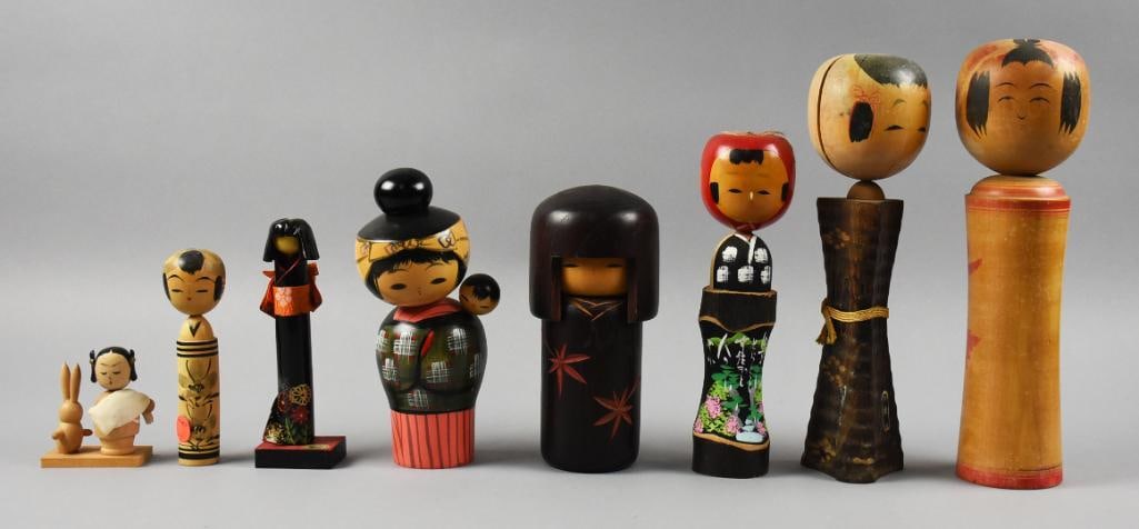 (8) Vintage Japanese Kokeshi Doll Assortment: These adorable dolls are vintage from Japan. They are Kokeshi dolls in various shapes and sizes. Some have original paper labels, some are signed. They each stand from approx.?3" to 12" tall.