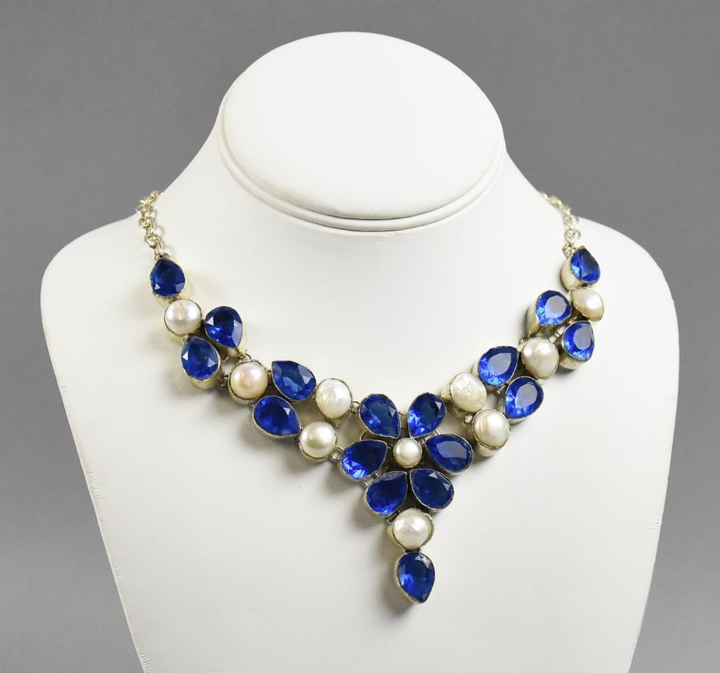 Designer Statement Necklace, Pearl & Crystal: This beautiful necklace is statement style. Silvertone chain with blue crystals and what appears to be baroque pearl. Measures approx. 18" long.