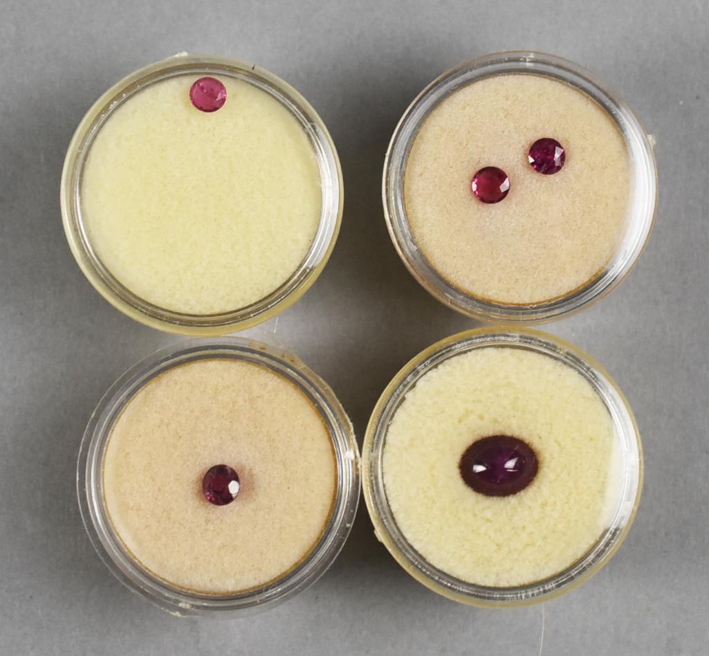 Natural Ruby Gemstones: Lot is five gorgeous loose rubies. There are four round and one oval. Will come in cases as shown.