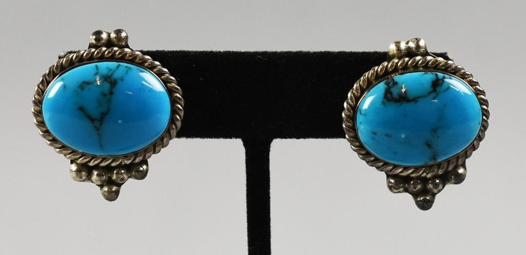 Vintage Mexican Sterling Turquoise Pierced Earrings: Beautiful pair of Mexican sterling earrings. Set with a pretty polished turquoise in a nice braided setting. They are stamped on back TF-31 Mexico 925.?