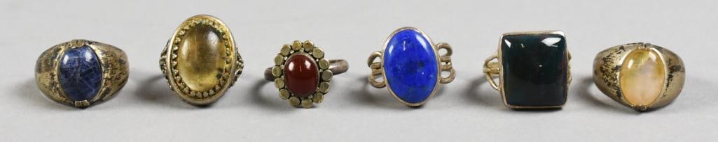(6) Sterling Silver, Semi Precious Stone Rings: Lot is for six fun sterling silver rings, each with semi precious stones. Some stones appear to be lapis, jasper, moonstone and more. Sizes are approx. 6 - 9.5.