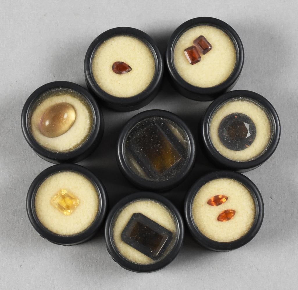 Citrine & Smokey Quartz Gemstones Assorted: Wonderful assortment of vintage loose gemstones of citrine and smokey quartz. All are various shapes and sizes and come in cases as shown.