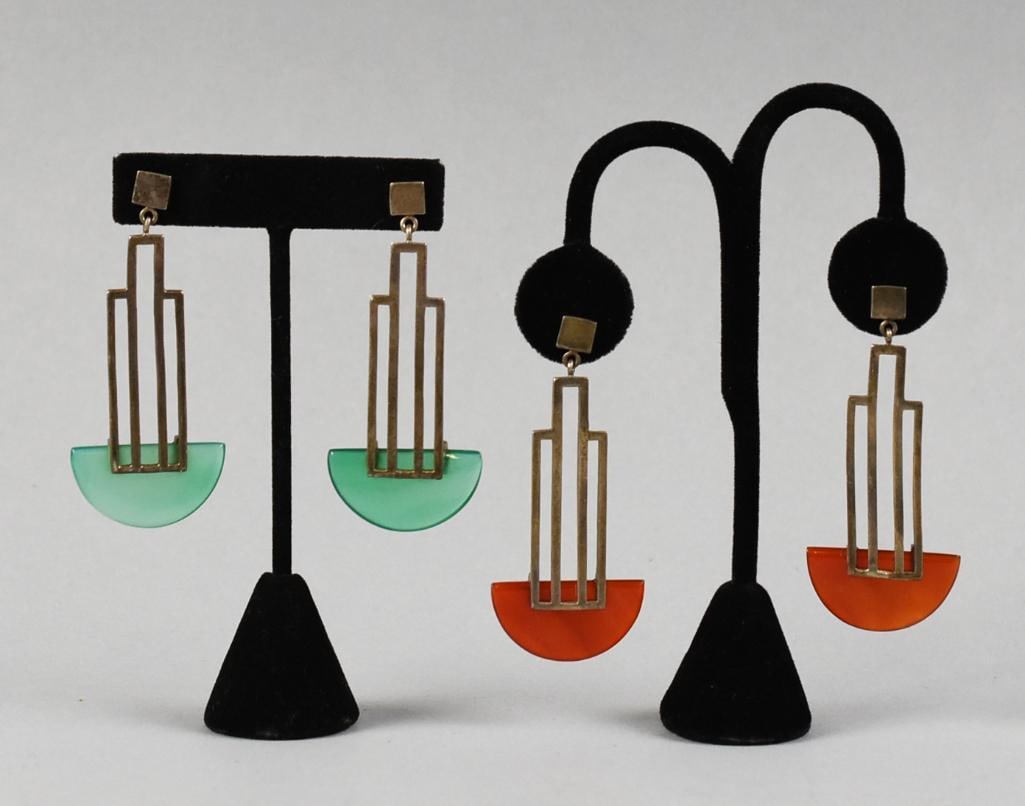 Art Deco Style Sterling & Casein Skyscraper Earrings: Two stunning pair of Art Deco style sterling earrings. Each is skyscraper style, half circle accents in amber and turquoise color appears to be casein. Each stamped 925 and are approx. 3" long.