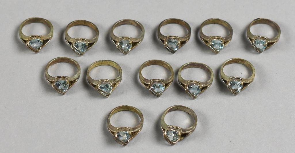 Sterling & Aquamarine Heart Rings Vintage: Lot is for 13 vintage sterling silver and aquamarine heart rings. All are the same style and are approx. size 6 to 6.5. All are the same style, would be great gifts.