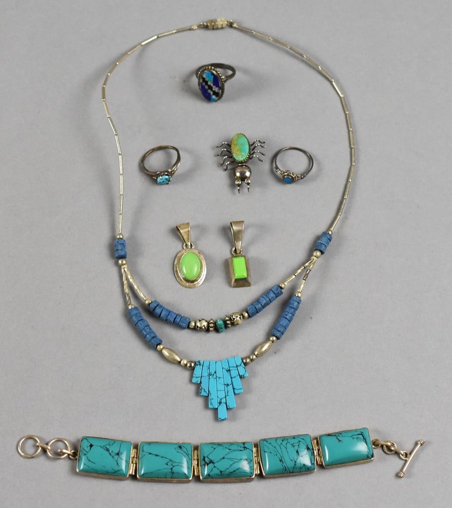 Sterling & Turquoise Jewelry Vintage: Beautiful collection of sterling and turquoise jewelry. Lot is a terrific bib style necklace, bracelet with toggle clasp, spider brooch, two pendants and three rings - one also inlay of lapis, onyx