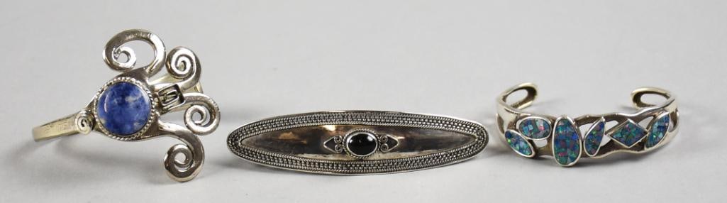 Sterling & Alpaca Bracelets & Barrette Vintage: Great looking vintage lot of sterling and Alpaca jewelry. The first bracelet, stamped Alpaca Made in England appears to be a fork set with what appears to be sodalite. One bracelet is set with opal mo