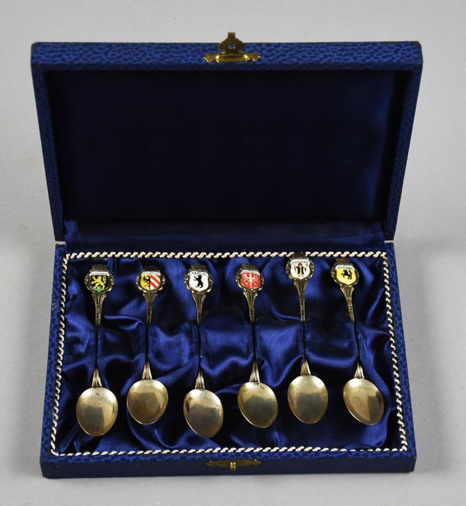 Fritz Reu & Co German 800 Silver Souvenir Spoons Vintage: Nice collectible set of souvenir spoons from Germany. They were crafted by Fritz Reu & Co and are 800 silver. Each has what appears to be enamel crests of various German cities. They are all marked