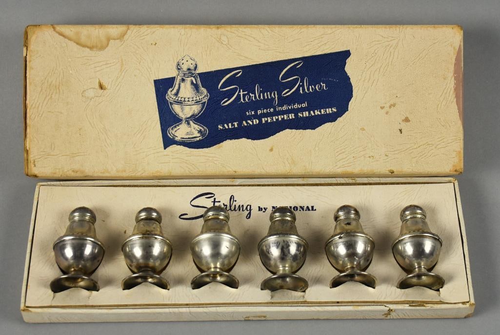 National Sterling Individual Saltshaker Set Vintage: Very fun set of six vintage sterling saltshakers. These individual salts come from National Silver and are in the original box. Each stands approx. 2" tall with an overall approx. weight of 46 grams.