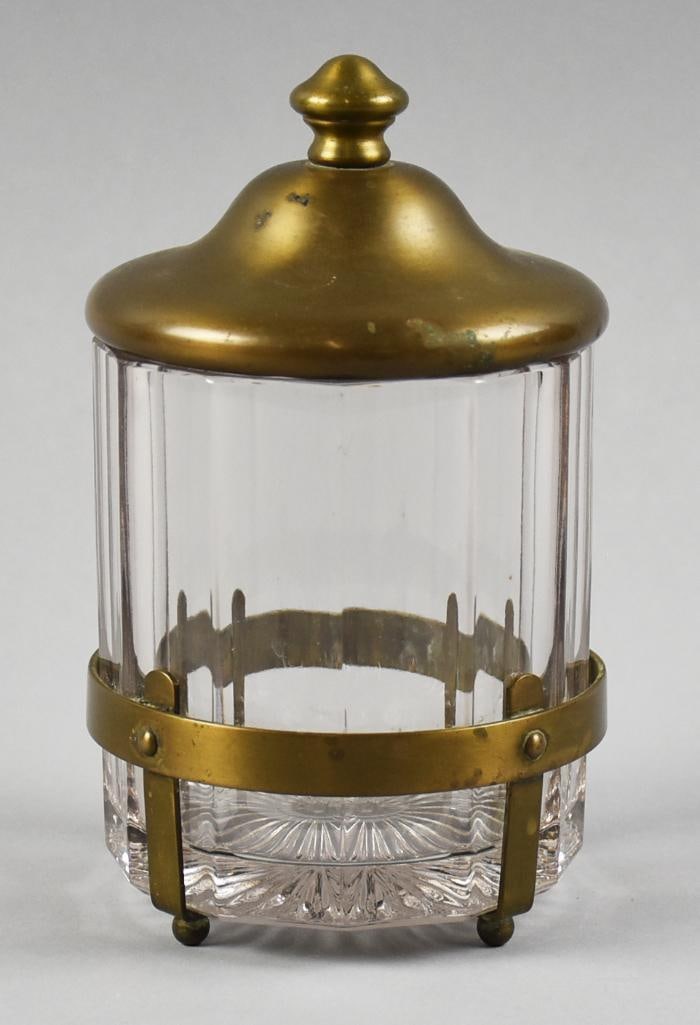 Antique Bradley & Hubbard Brass & Crystal Humidor: Wonderful antique humidor from Bradley & Hubbard. Brass frame and lid and optic crystal jar. Lid and inside frame are stamped with the manufacturer. Measures approx. 7" x 4".