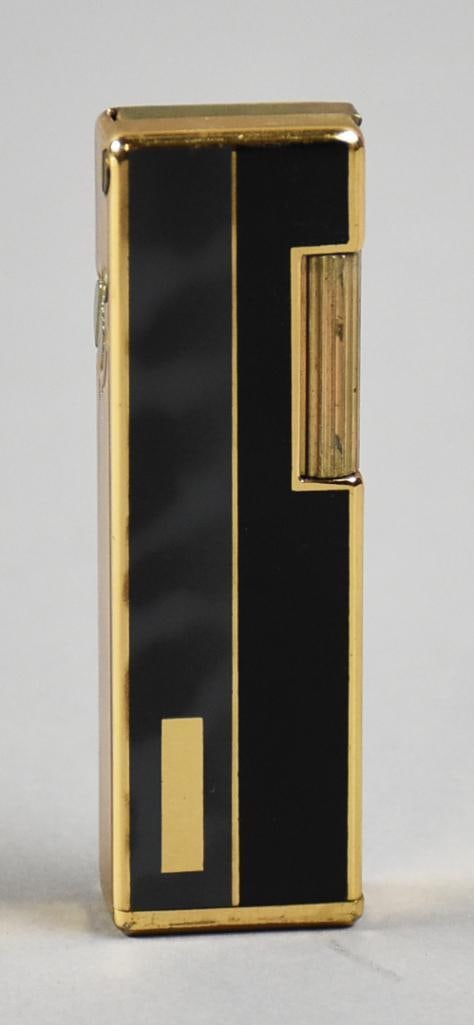 Vintage Colibri Gold Tone and Lacquer Lighter: Very nice vintage Colibri cigarette lighter. Slim body, gold plated with black lacquer. Marked on bottom.