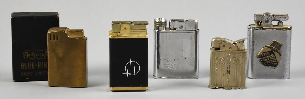 (5) Vintage Cigarette Lighters: Lot is for five interesting cigarette lighters from various makers. Includes two different musical lighters, Blue Bird and more.?