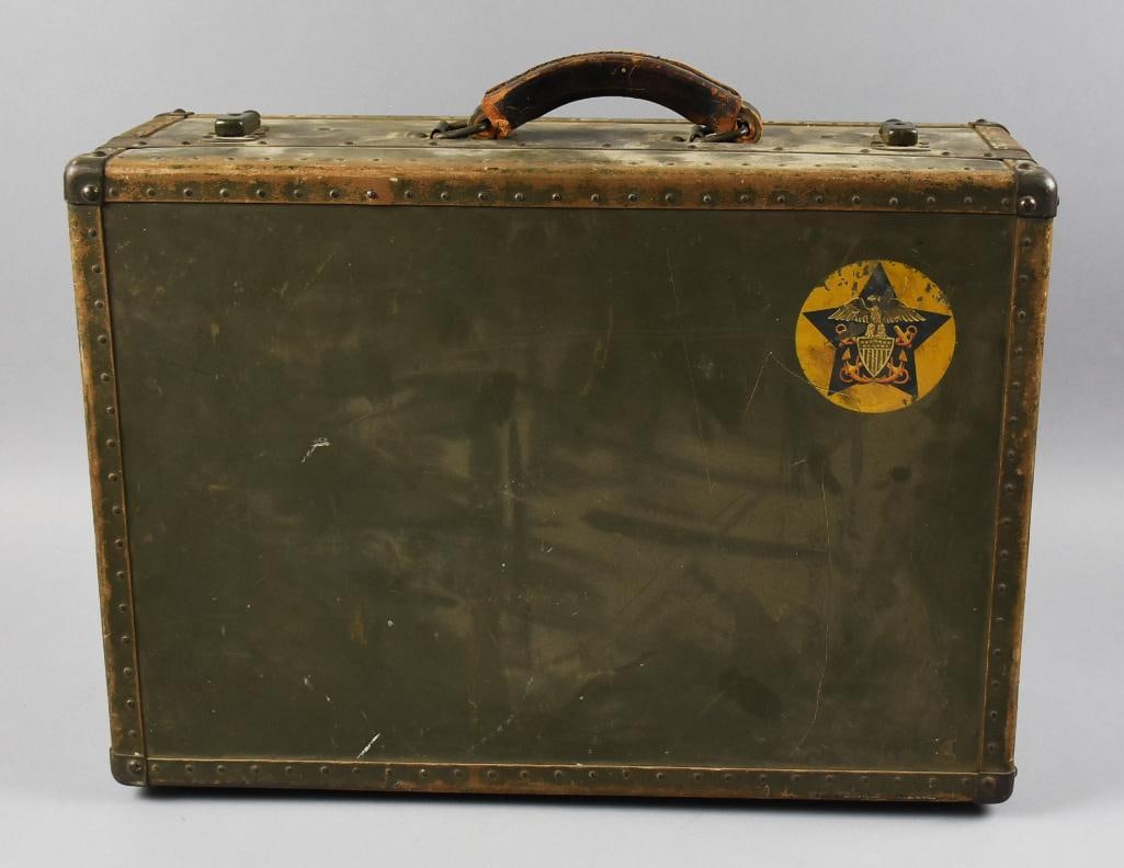 Vintage Hartmann US Navy Seapack Suitcase: This very cool suitcase is for the United States Navy. It is in the typical olive drab with the Navy seal decal, the top has the Harmann?label. This suitcase known as the Seapack?appears complete
