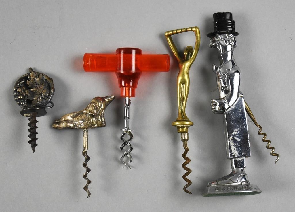 Vintage Novelty Corkscrew Assortment: Fun lot for collectors is this novelty corkscrew lot. You will get figural of Old Snifter, a nude, grape & leaf, reclining gnome and one that appears to be a bakelite handle. Measure from approx. 3" t