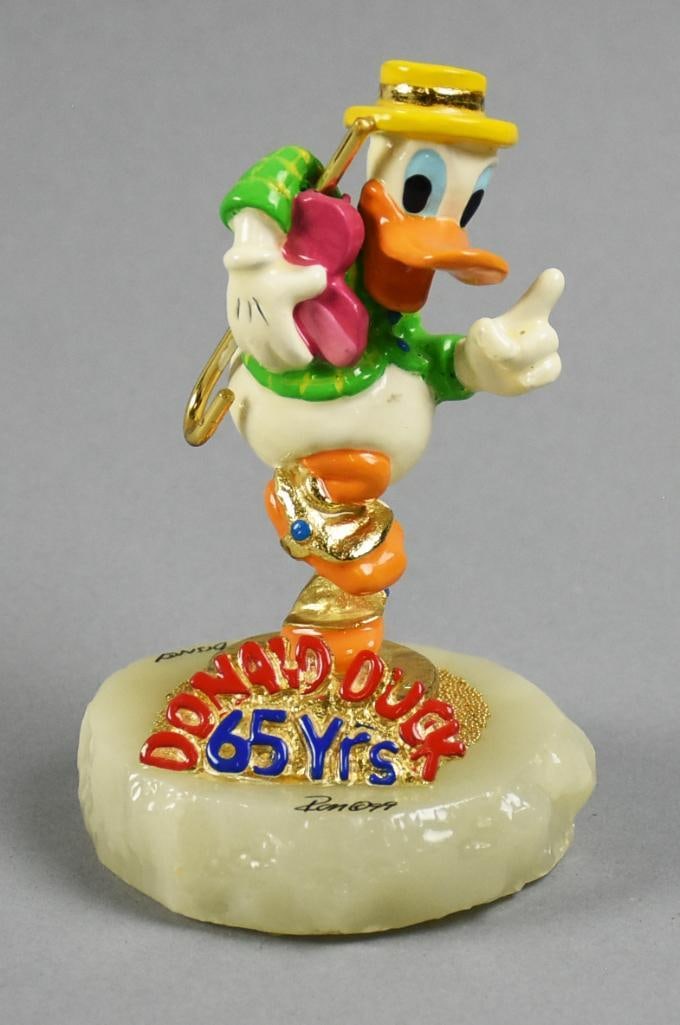 RARE Ron Lee Ltd Ed Disney Donald Duck 65 Years 72/1000: Ron Lee designed a few of these adorable figurines commemorating Donald Duck 65 Years. This figurine is called "Decorating Donald" and is hand painted pewter on what appears to be an onyx base. Signed
